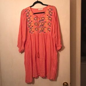 Peach dress with festive accents